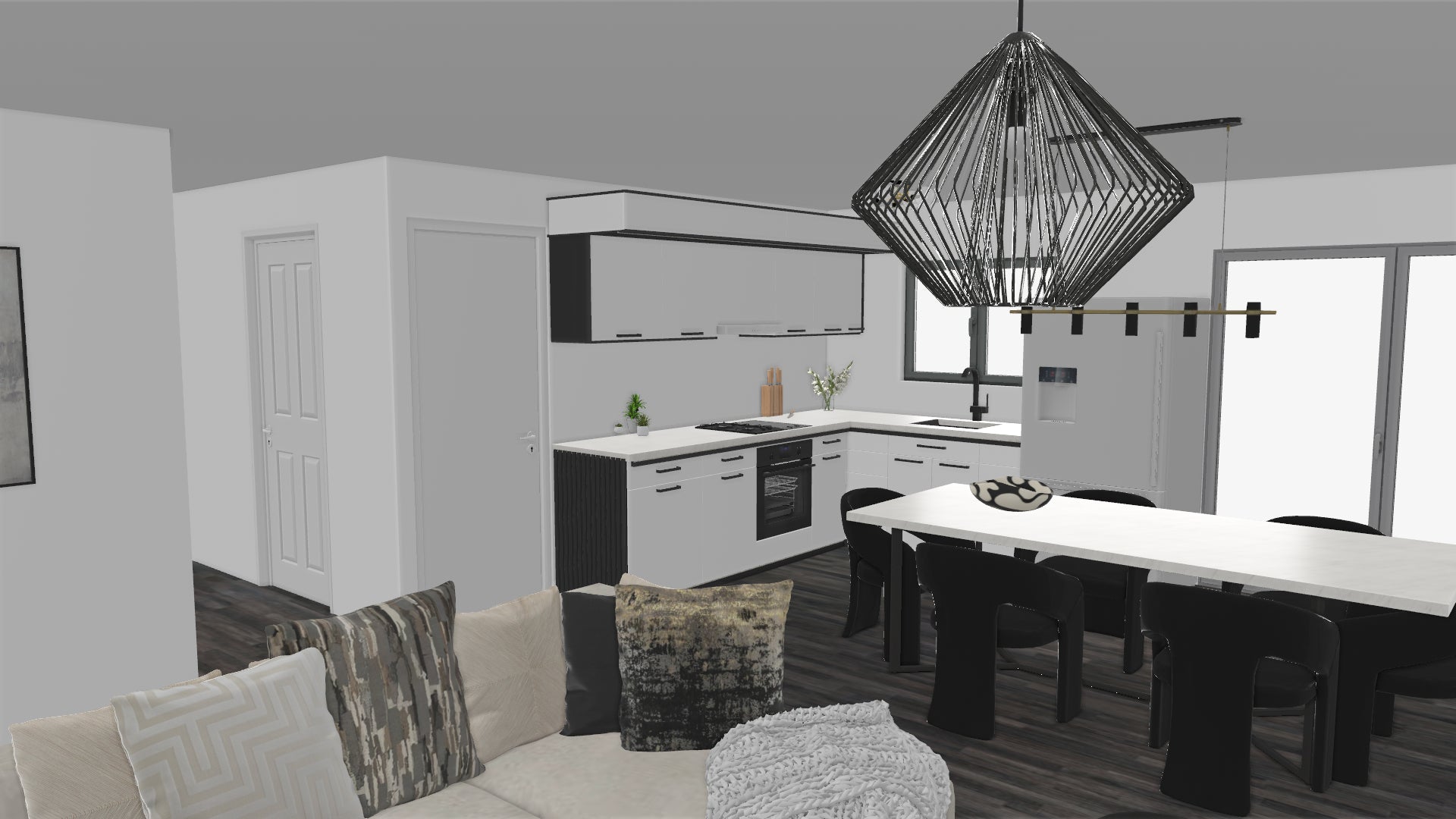 Modern kitchen and dining area with white cabinets, black and white accents, appliances, and a chandelier.